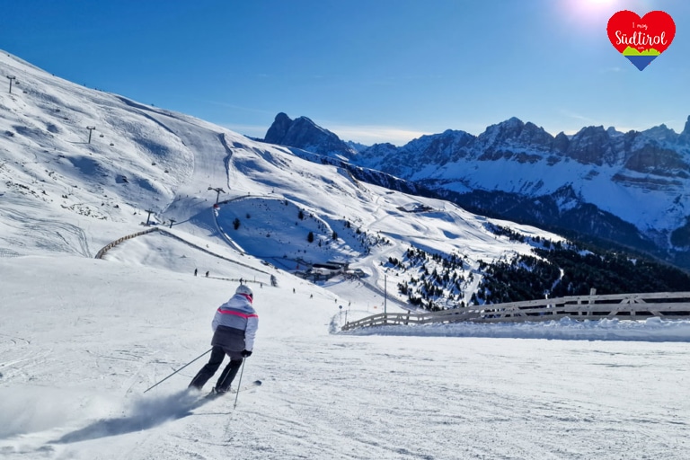 skigebiet-plose-brixen-skipiste-skifahrerin